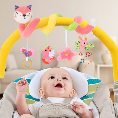 bebe sourit cosy regarde spirale d activite bebe