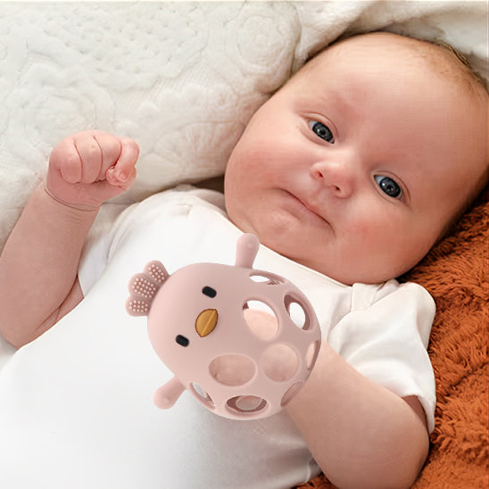 bebe tient anneau de dentition bebe rose pastel