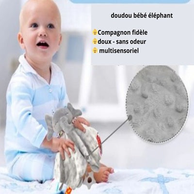 bebe tient doudou bebe ultra doux
