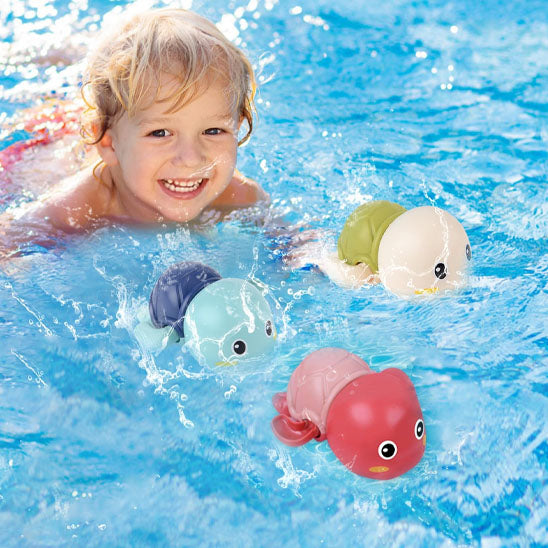 garcon nage jouet de bain tortue flottent eau