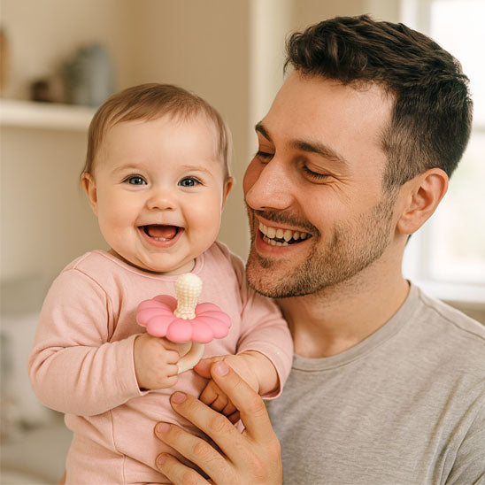 papa porte bebe avec anneau dentition bebe fleur rose