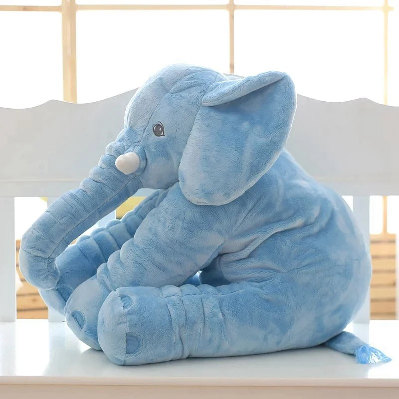 peluche elephant geant bleu assis banc