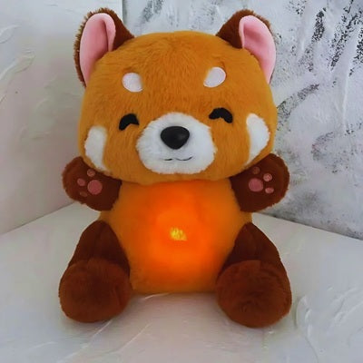 peluche qui respire panda lumineux sur canape