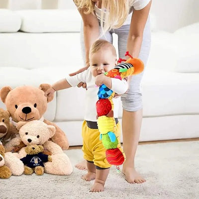 premier pas bebe avec hochet maman