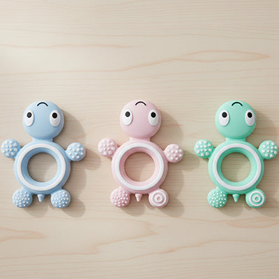 anneau dentition bebe presente avec trois couleurs rose bleu