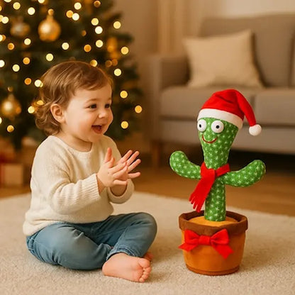 bebe assis frappe mains regarde peluche interactive cactus noël