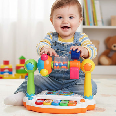 bebe assis tapis chambre joue jouet eveil bebe piano