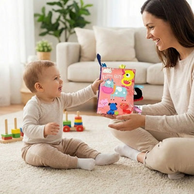 bebe assis tapis tend maman livre bebe en tissus