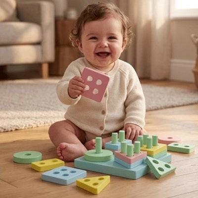 bebe assis tapis tient main carre rose puzzle bebe