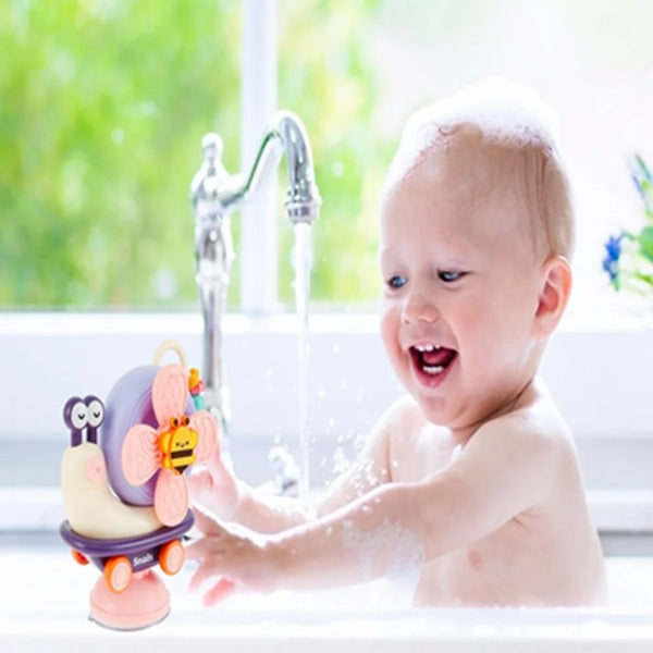 bebe dans baignoire joue jouet pour bebe escargot