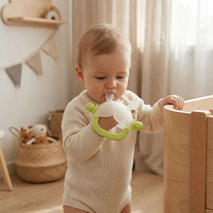 bébé debout mordille embout anneau de dentition vert
