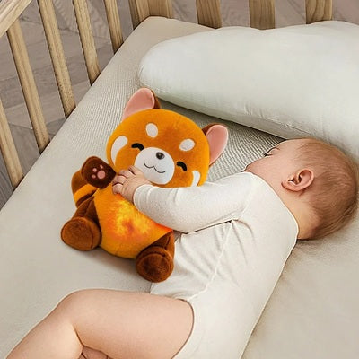 bebe dort berceau avec peluche qui respire panda