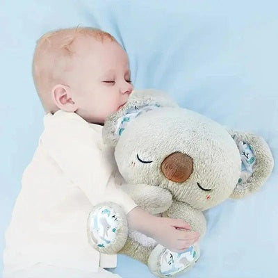 bebe dort lit drap bleu avec peluche bruit blanc