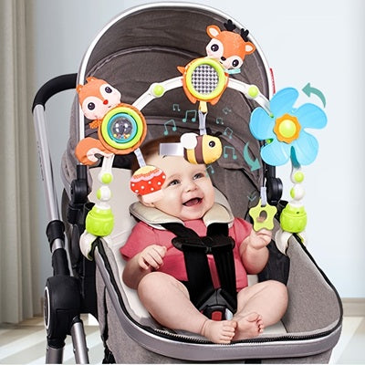 bebe joyeux regarde mobile musical bebe fixe poussette