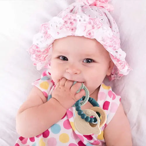 bébé met bouche anneau dentition bébé planète
