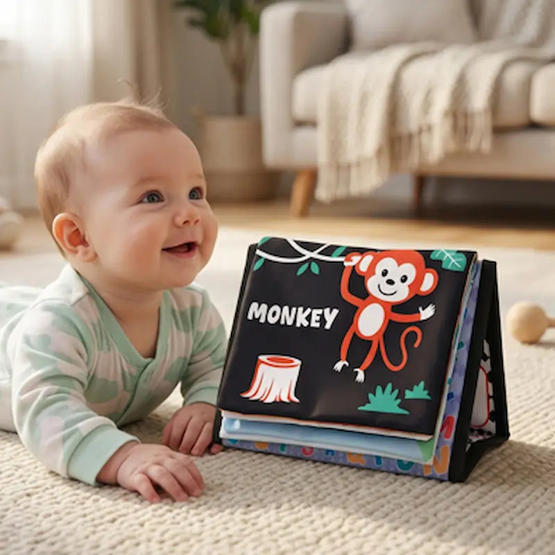 bebe tummy time livre bebe en tissus singe devant bebe