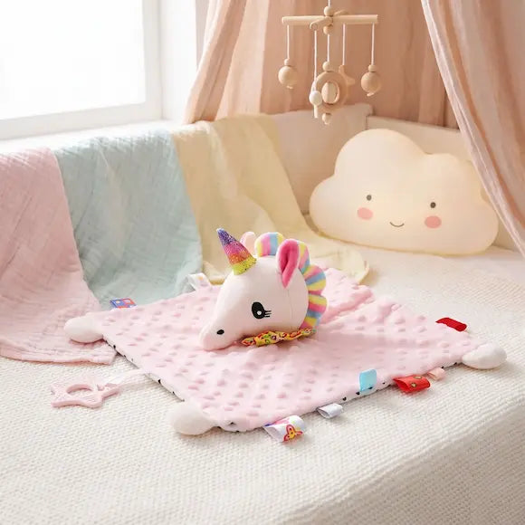 doudou bebe licorne rose pose plat berceau bebe