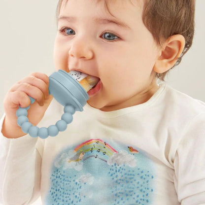 grignoteuse bebe bleue dans bouche bebe