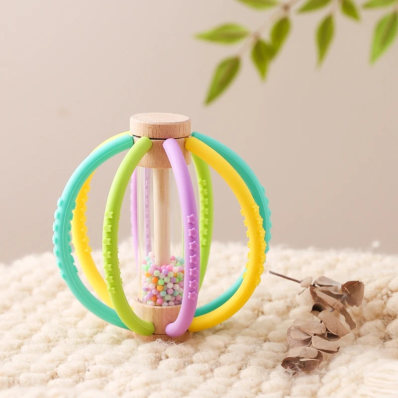 hochet pour bebe sphere jaune vert