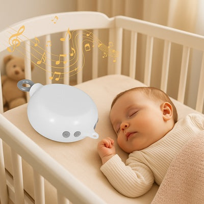 mobile bebe boite a musique posee pres bebe dort lit