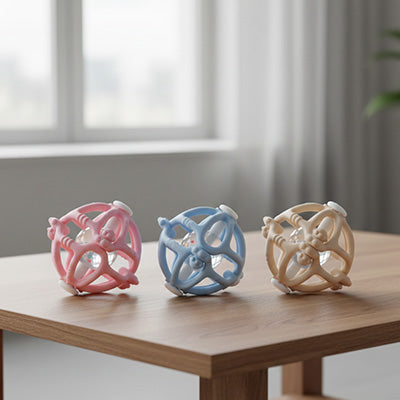 trois couleurs hochet bebe bleu rose marron